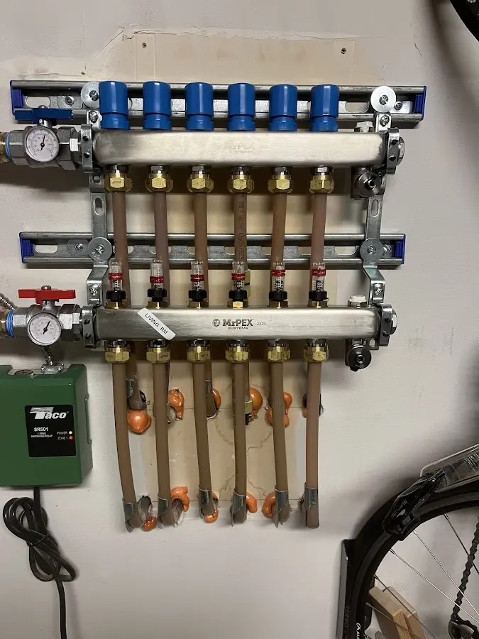 Plumber performing Leak Detection at a residential property in Ashland